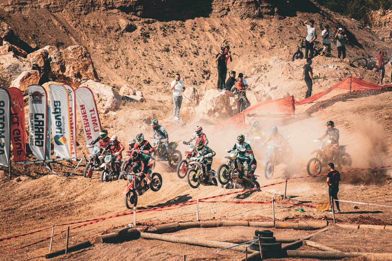 Home Motocross riders compete fiercely in an energetic and dusty off-road race.